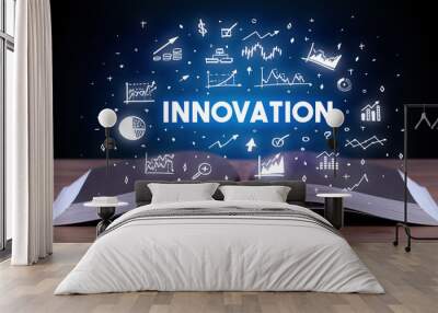 INNOVATION inscription coming out from an open book, business concept Wall mural