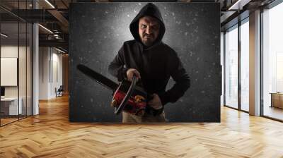 Masked armed villain in empty dark room with gun ax chainsaw mallet wrench
 Wall mural