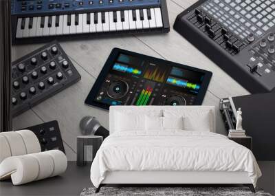 Mixing music on tablet with electronic music instruments concept Wall mural