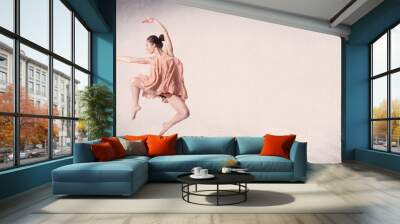 modern ballet dancer performing art jump with empty background Wall mural