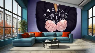 Office worker with drawn icons in the palm Wall mural