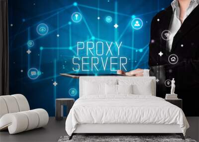 Person holding tablet, security concept Wall mural