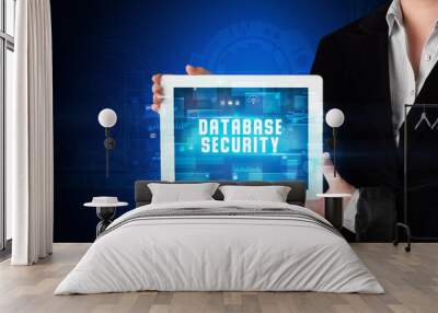 Person holding tablet, security concept Wall mural