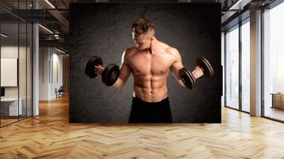 Sexy weight lifter guy showing muscles Wall mural