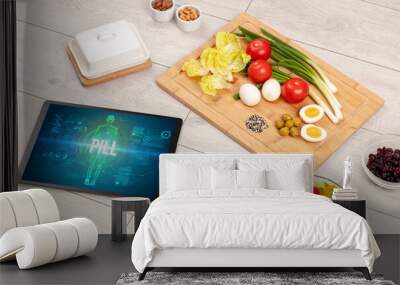 Tablet Pc with fruits, medical concept Wall mural