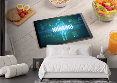 Tablet Pc with fruits, medical concept Wall mural