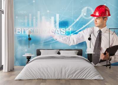 Young Businessman with helmet concept Wall mural