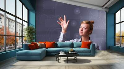 Young businesswoman touching copy space Wall mural