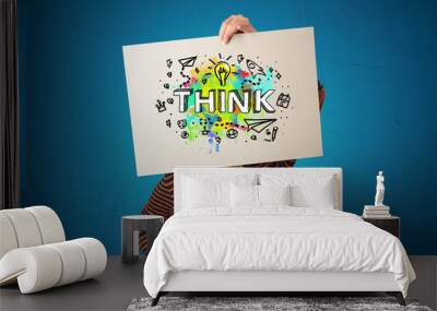 Young person holding paper with design thinking concept 
 Wall mural