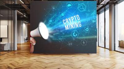 Young woman shouting in megaphone with CRYPTO MINING inscription, Modern technology announcement concept Wall mural