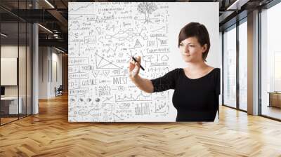 Young woman sketching and calculating thoughts Wall mural