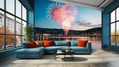 Dynamic and Colorful Fireworks Display Over Cityscape and Water. Celebrations, Festivals, Joyous Events Wall mural