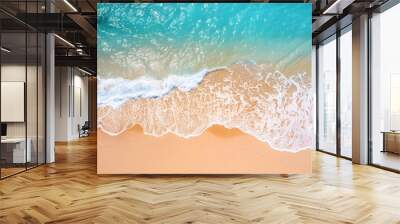 Aerial view of tide blue sea water and sandy beach Wall mural