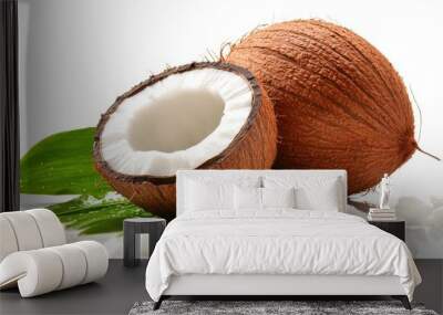 Coconut fruit with green leaf closeup view isolated over white background Wall mural