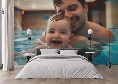 Dad and smiling baby in swimming pool. Wall mural