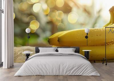 Fresh banana fruit on wooden table with abstract bokeh background Wall mural