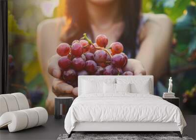 Fresh grape fruit in hands Wall mural