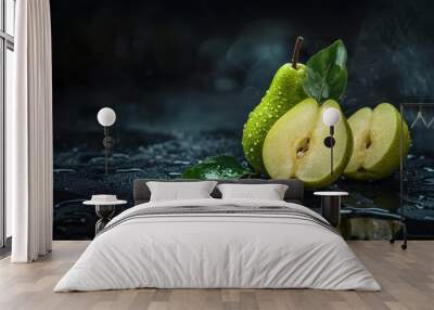 Fresh pear fruit and cut with dark background on table Wall mural