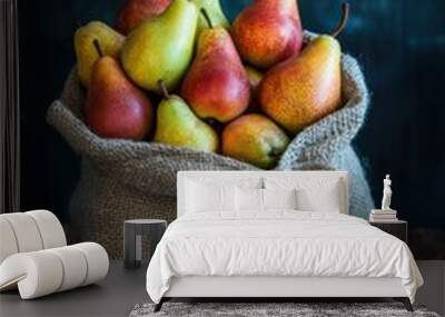 Fresh pear fruit on table with dark background Wall mural