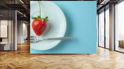 Fresh strawberry fruit in plate with fork Wall mural