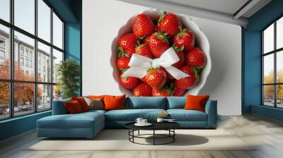 Fresh strawberry fruit in white bowl closeup view Wall mural