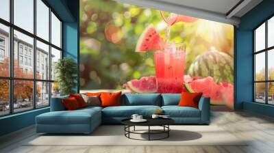 Glass of juice and fresh sweet ripe watermelon on table Wall mural