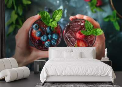 Hand hold summer drink with blueberry fruit Wall mural