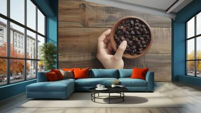 Raisin grain in bowl closeup view Wall mural