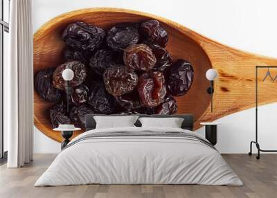 Raisin grain in wooden spoon closeup view Wall mural