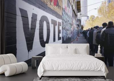 Voters wait in line to vote in voting season. Wall mural