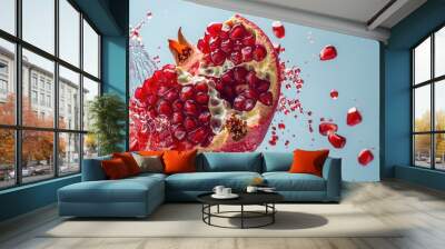 Water splash with fresh pomegranate fruit juice and seed Wall mural