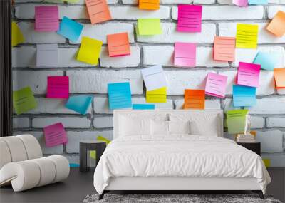 Colorful stickers on a white brick wall, ready for notes. There are also colorful sheets of paper, waiting for you to write messages on them. Wall mural