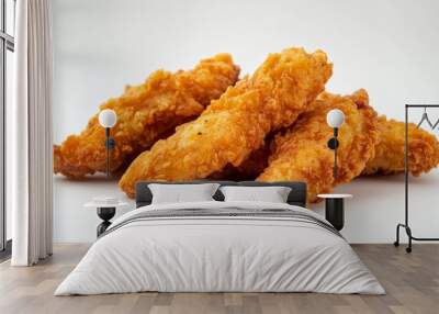 Crispy chicken fingers against a plain white backdrop. Wall mural