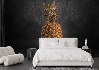 Pineapple tropical fruit on dark stone background background. Citrus fruit with vitamin c for helth care Wall mural