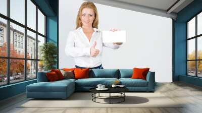 successful businesswoman showing map for advertising text. Wall mural