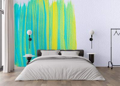 Green, yellow and blue mixed paint brush stroke on white canvas. Colorful watercolor acrylic paint stain on the white paper wall Wall mural