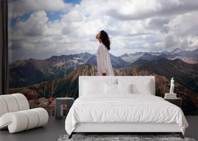 God Is A Woman. A woman in a white dress on the highest mountain in Bulgaria Wall mural