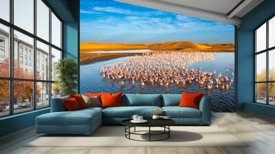 Desert scenery with saltwater lagoons full of beautiful flamingos. Namib-Nukluft National Park - Walvish Bay, Namibia Wall mural