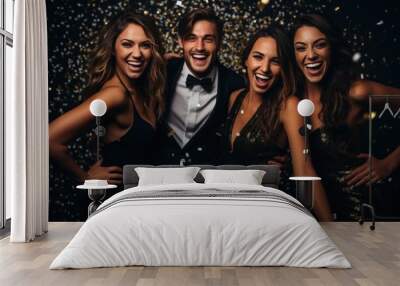 A company of happy young people in evening dresses and suits, smiling posing for camera. Party, graduation for students. Celebrating the new year. Wall mural