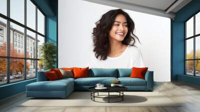 Closeup photo portrait of a beautiful young asian indian model woman smiling with clean teeth. Used for a dental ad. Isolated on light background. Wall mural