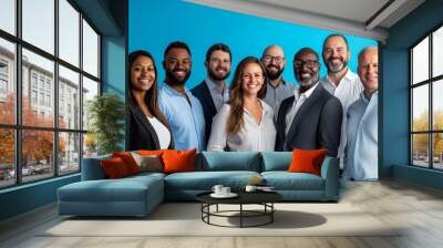 Energetic group of diverse professionals, smiling confidently. Portrait on solid blue background. Perfect for business solutions, teamwork training, office supplies. Wall mural