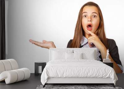 surprised teen girl showing a product Wall mural