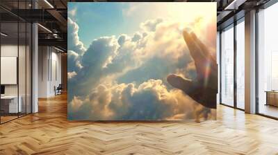 Person Holding Their Hand Up In The Air With The Sun Shining In The Sky Praising and Praying Wall mural