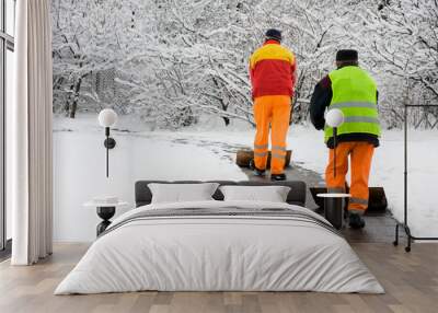 Workers removing first snow Wall mural