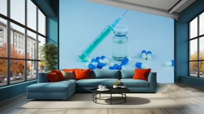 syringe with needle, vial and pills with steroids. illegal doping in sport concept Wall mural