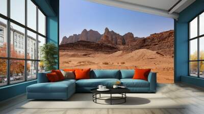 orange sand and rocky mountains on wadi rum desert Wall mural