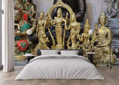 exquisite copper sculptures of hindu gods like ganesha, shiva, and lakshmi. meticulously crafted, th Wall mural