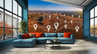 Aerial view of land with network markers representing land development planning and connectivity. Wall mural