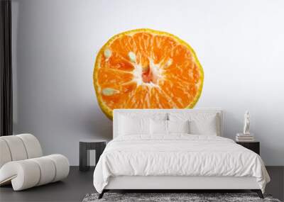 Close-up of freshly cut orange fruit isolated on white background Wall mural