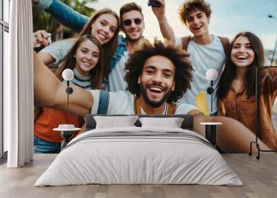 group of friends,Multiracial friends taking selfie picture with smart mobile phone outside -Laughing young people celebrating standing outside and having fun -Friendship concept with guys and girls. Wall mural